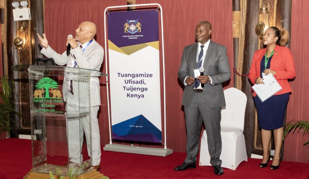 Mr Mbarak fielding questions from participants at the workshop for media practitioners. Looking on are EACC Director for Field Services, Mr Jackson Mue and NTV’s Olive Burrows